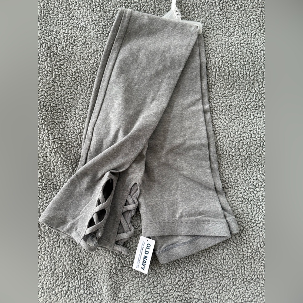 Old Navy Girls 7/8 Leggings, NWT
Open ankle w/ crisscross 
Cotton/Poly/Spandex